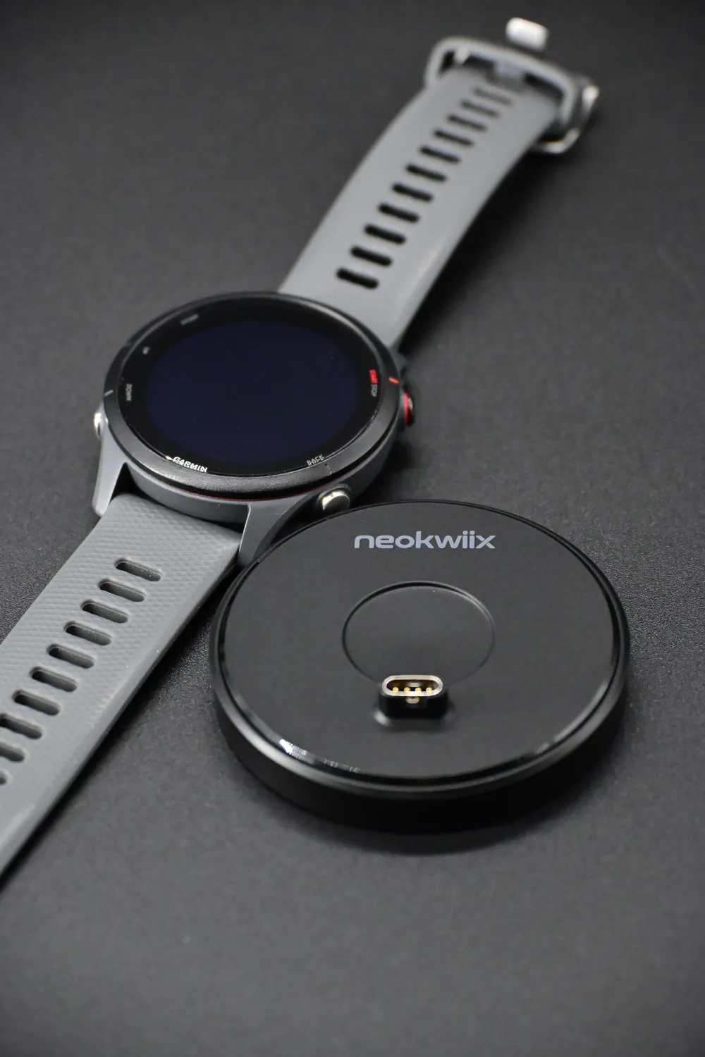 Garmin watch and the 4-pin adapter, top view